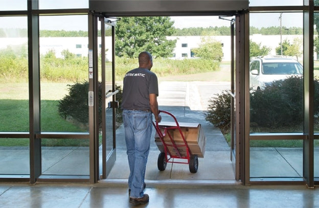 delivery guy using automatic door