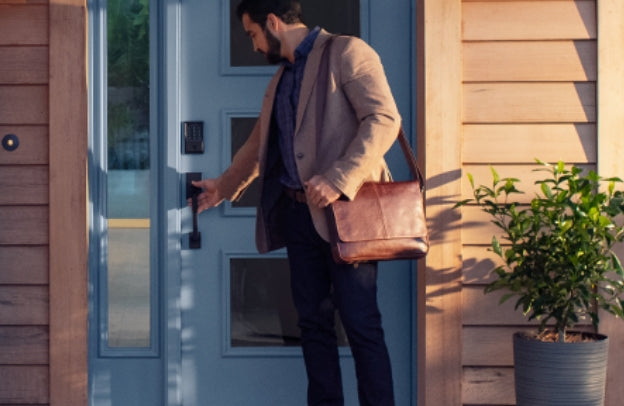 A person opening a door