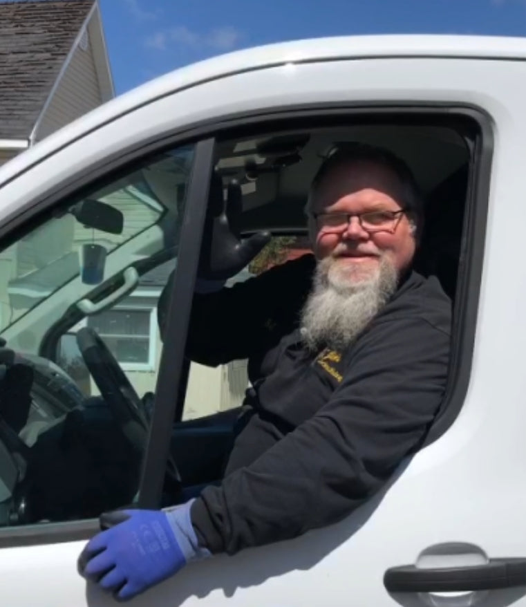 emergency locksmith service worker waving