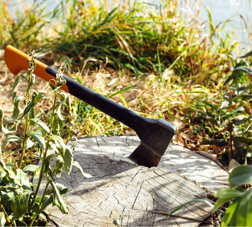 sharp axe stuck in wood