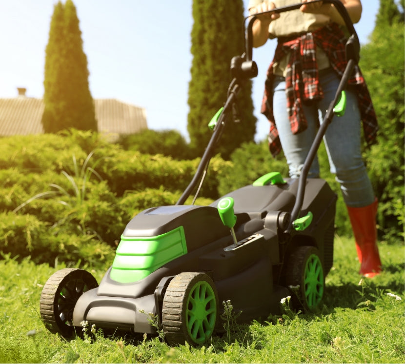 cutting the lawn with a lawnmower